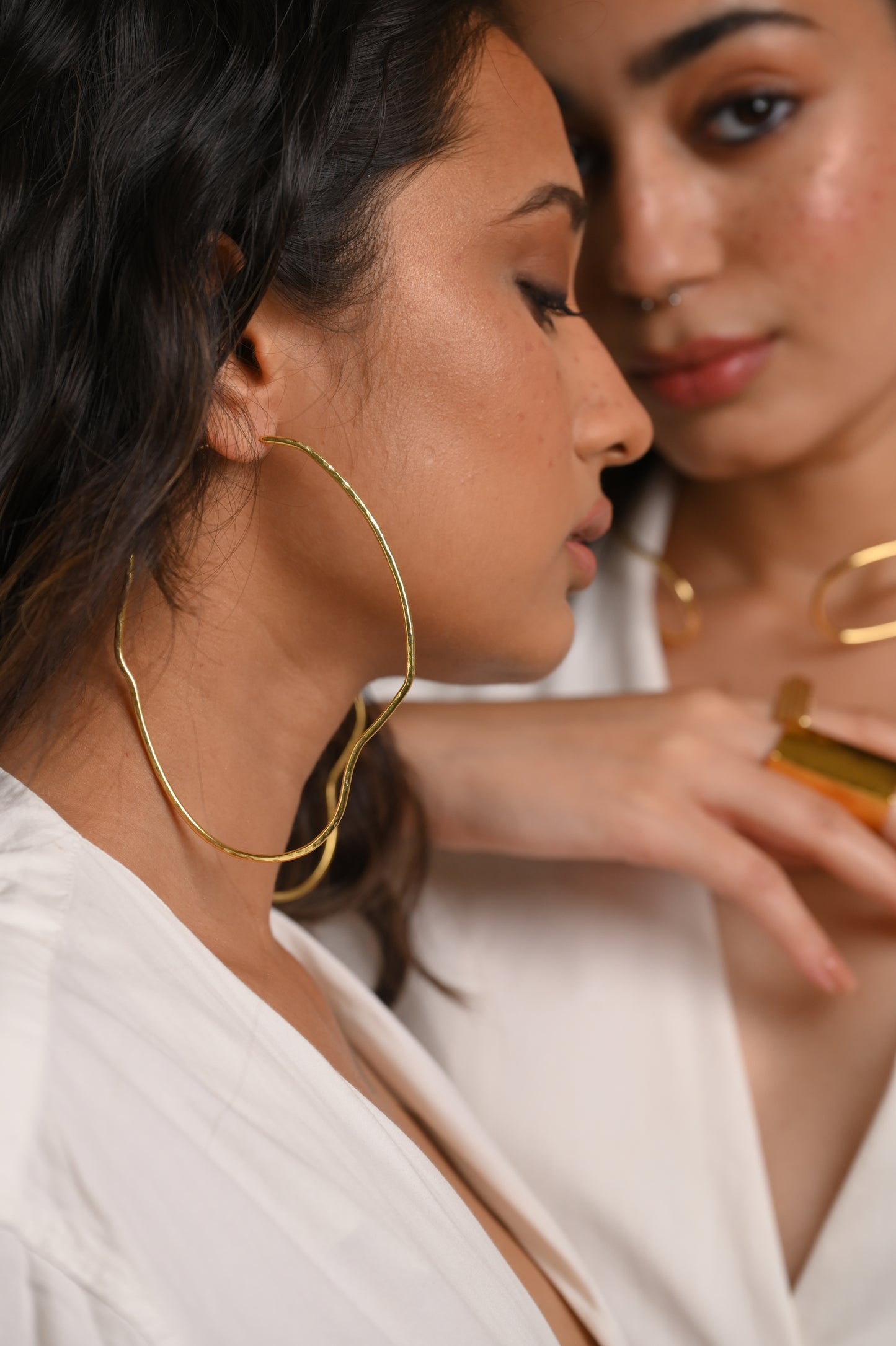 Curved Hoops in Gold