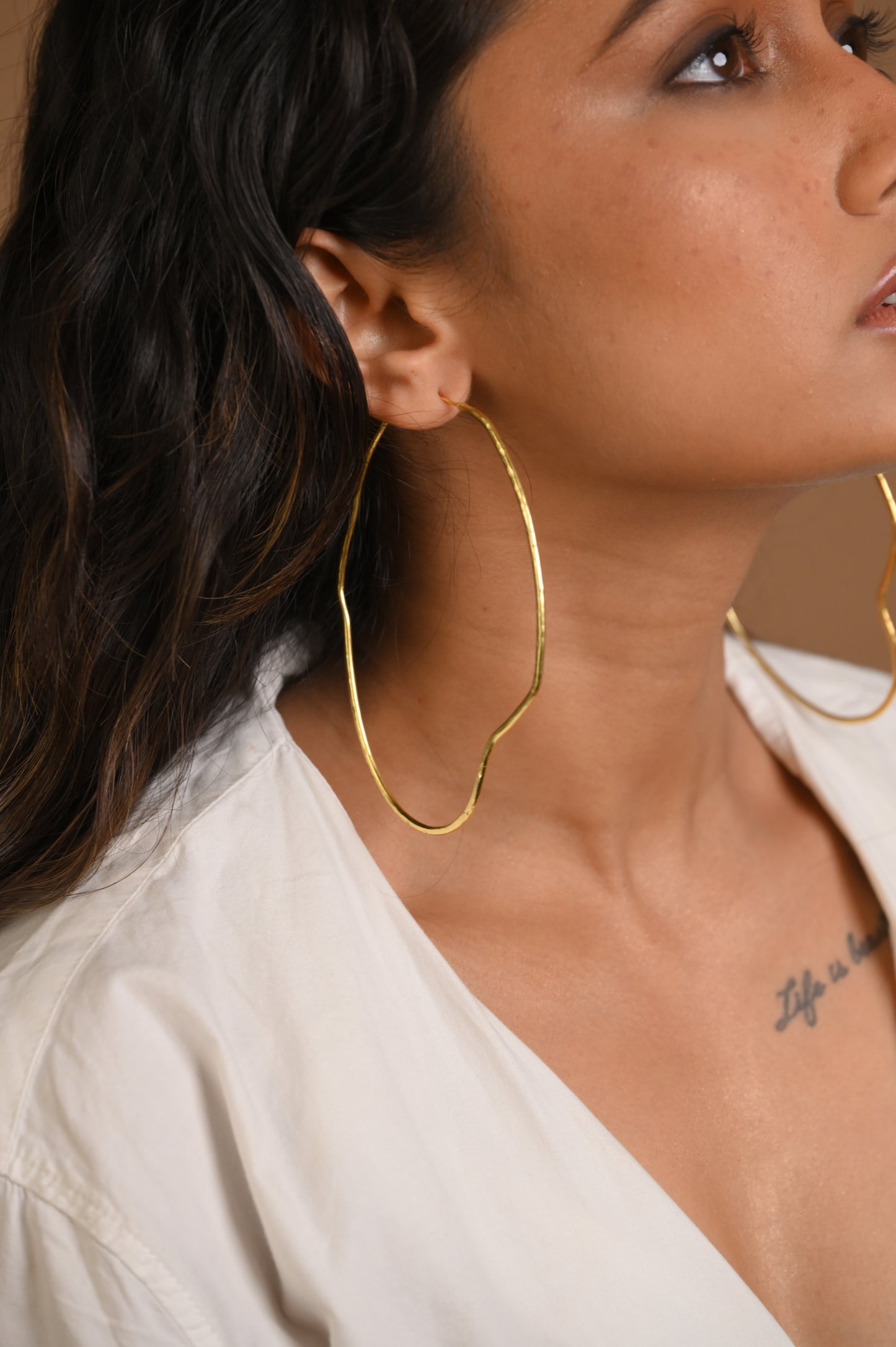Curved Hoops in Gold