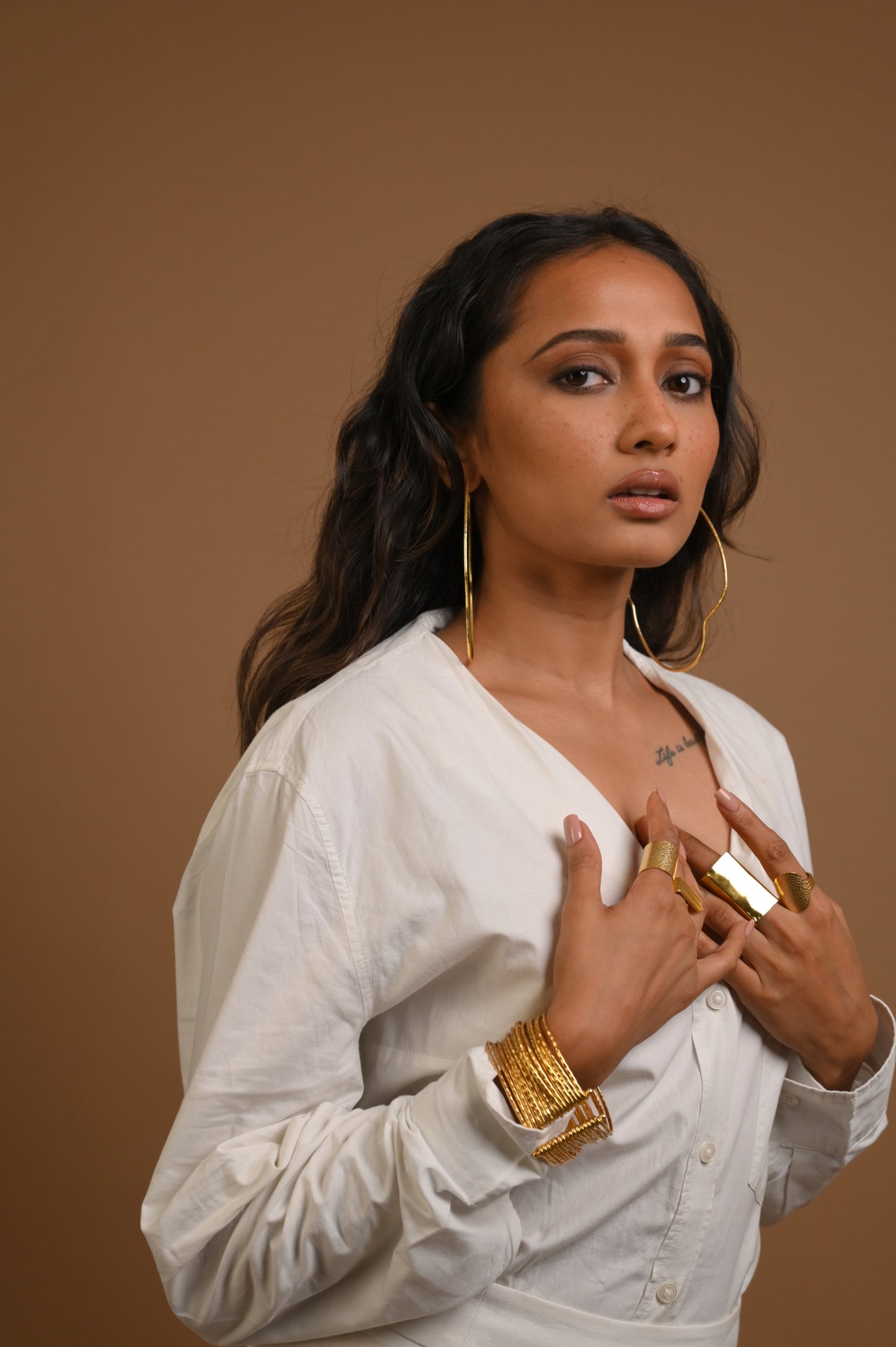 Curved Hoops in Gold