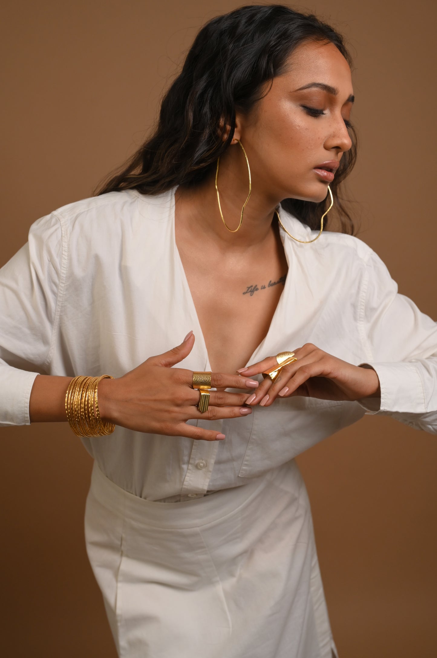 Curved Hoops in Gold