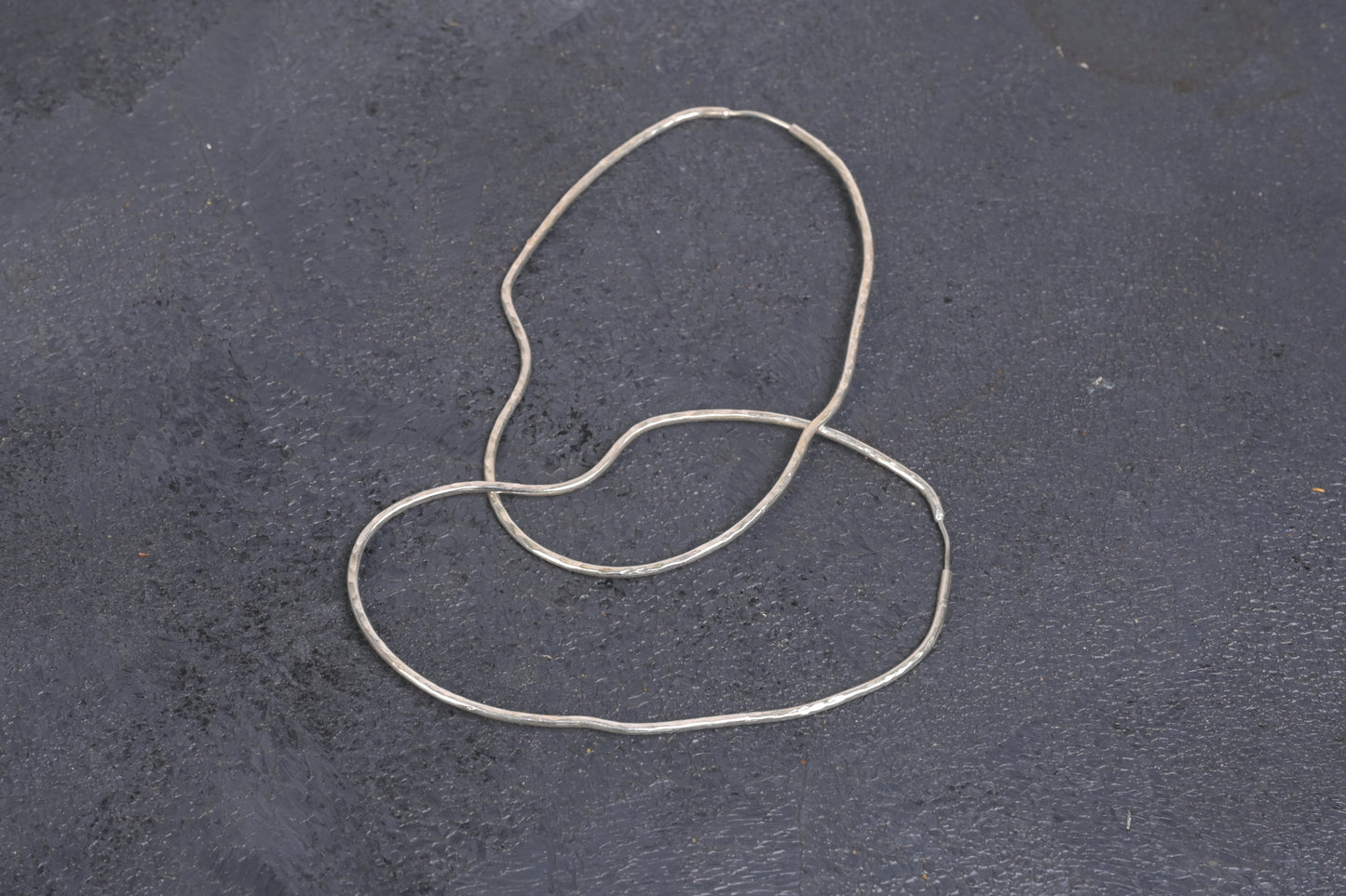 Curved Hoops in Silver